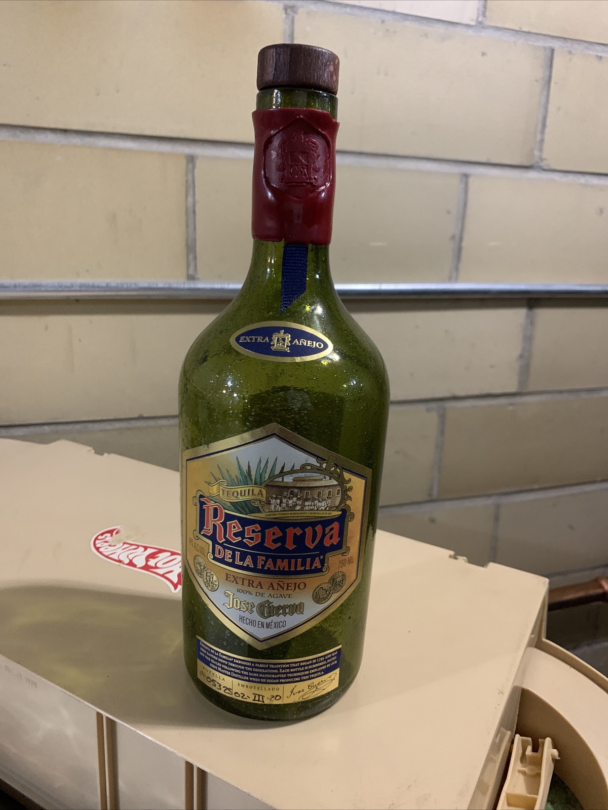 The empty bottle of Jose Cuervo Reserva De La Familia extra anjeho tequila 750ml