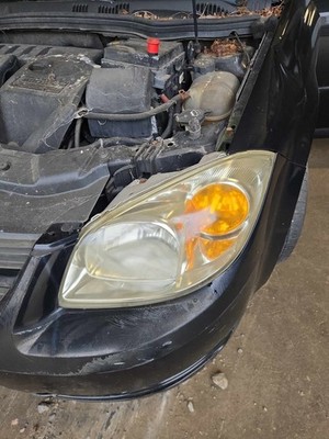 Used Left Headlight Assembly fits: 2009 Chevrolet Cobalt Left Grade B