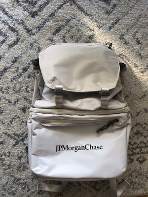 J.P. Morgan branded cooler backpack light grey with pockets and compartments