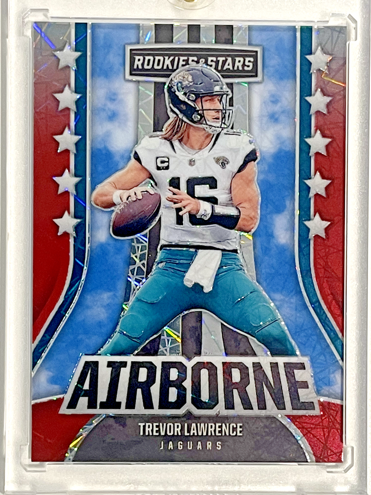 2023 Rookies & Stars Trevor Lawrence Airborne Red Longevity Lazer