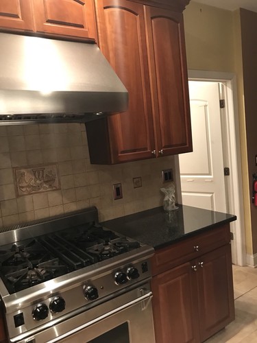 Kitchen Cabinets, Counter Tops & TV