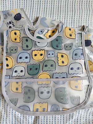NWoT Easy Clean 4 Pack Chickpea PVC Bib- Monsters
