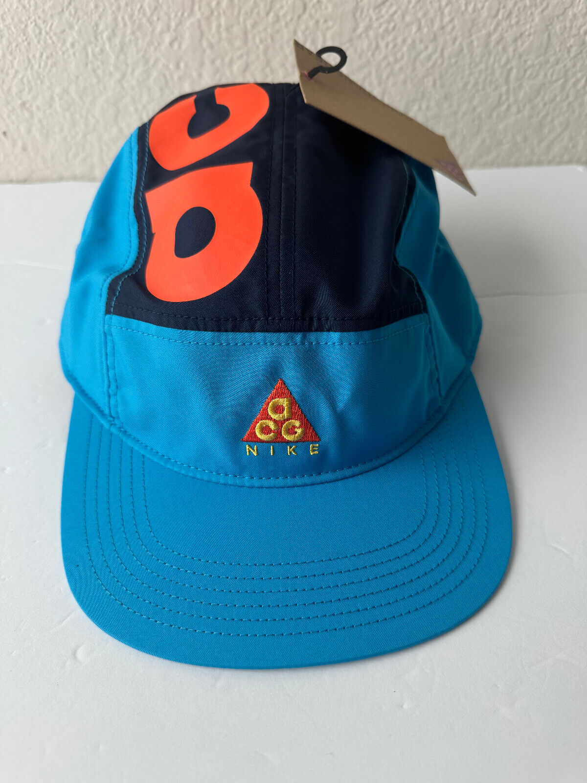 NIKE ACG AW84 DRY 5 PANEL HAT Unisex HABANERO ORANGE BLUE NIKE ACG AW84 DRY 5 PANEL HAT Unisex HABANERO ORANGE BLUE