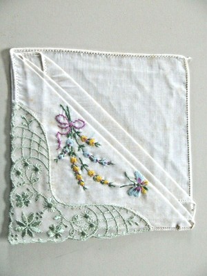 Vintage delicate beige colored embroidered handkerchief