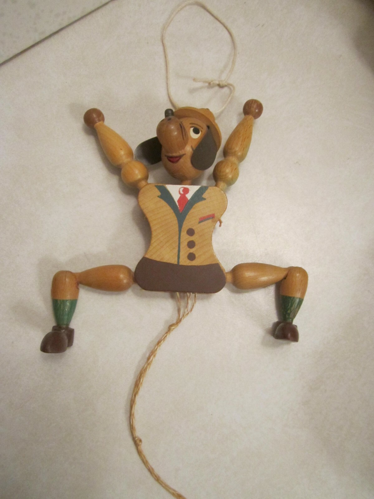 vintage wooden dog jumping-jack (marionette) puppet