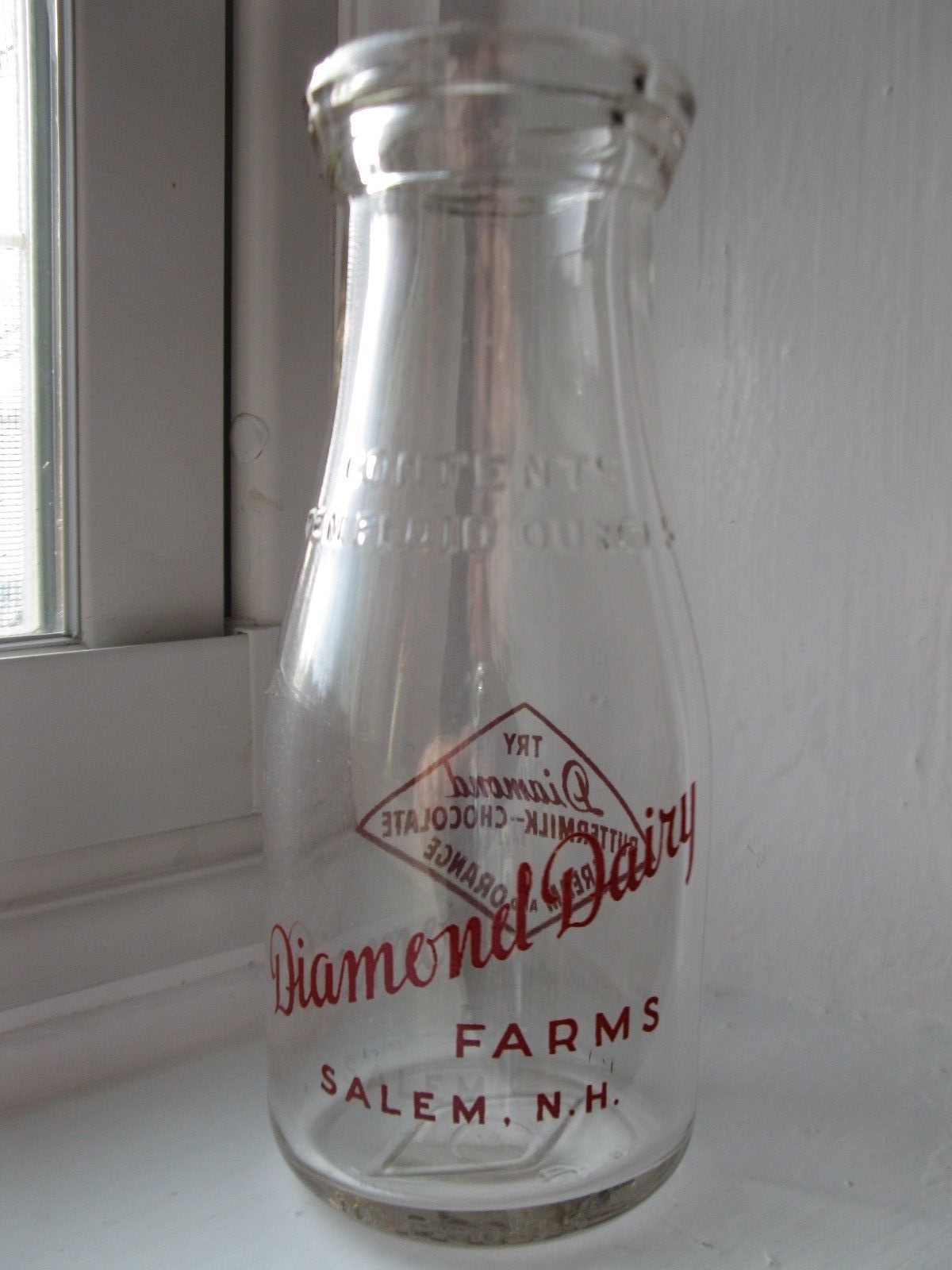 Vintage milk bottle Diamond Dairy Farms Salem, N.H. RD pyro