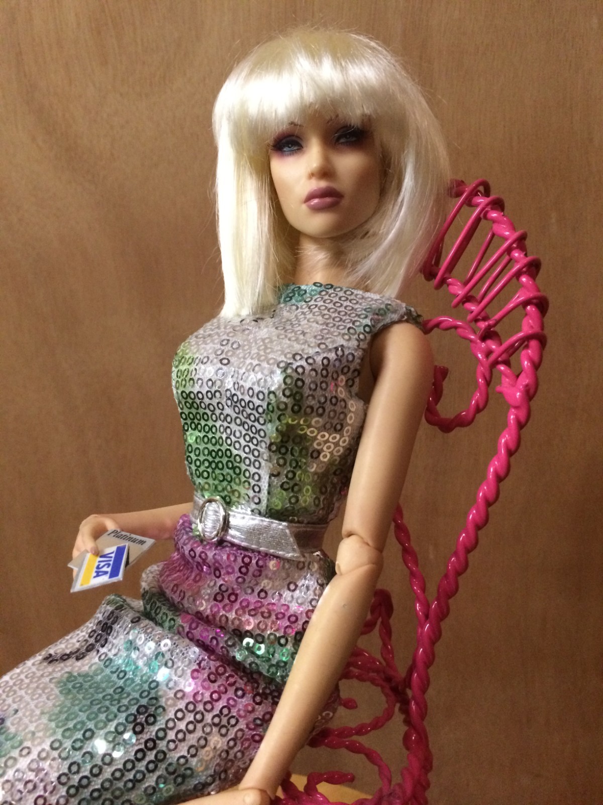 Sybarite doll superdoll superfrock in micro sequin gown, pink heels, silver bag