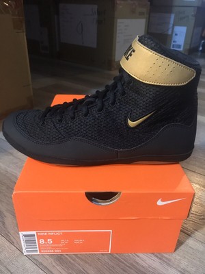 nike inflicts black and gold