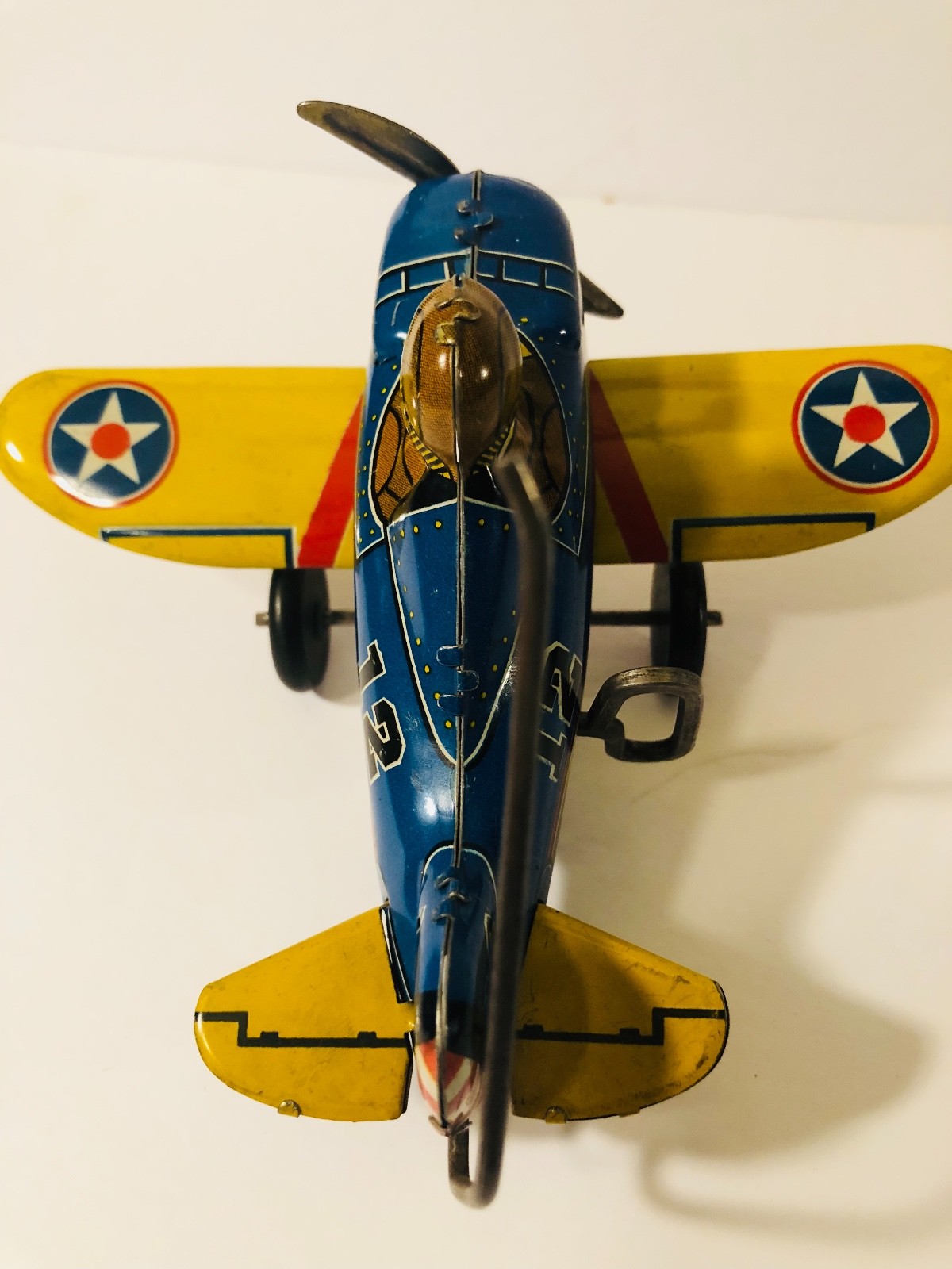Excellent 1940's Marx Blue Tin Roll Over #12 Airplane with Pilot Windup