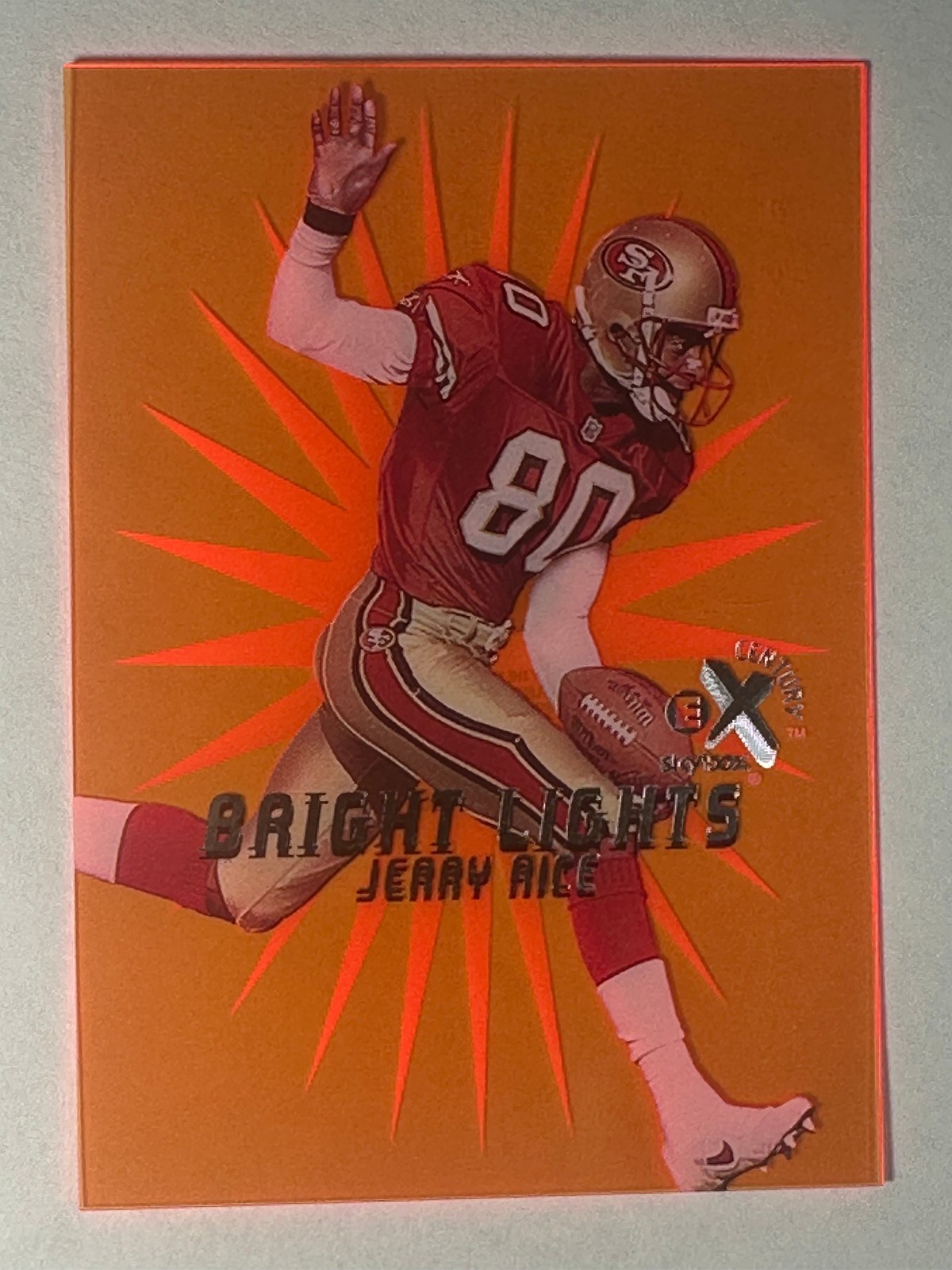 1999 Skybox EX Century Bright Lights Orange #12 Jerry Rice