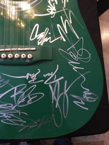 AUTOGRAPHED GUITAR WITH LOTS OF SIGNATURES FROM COUNTRY ARTISTS