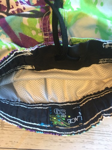 Childens Place XS lined Boys Swimsuit With Skull.  Green, Blue, Purple, White