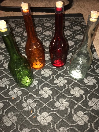 Set of 4 Decorative Glass bottles (extended neck)