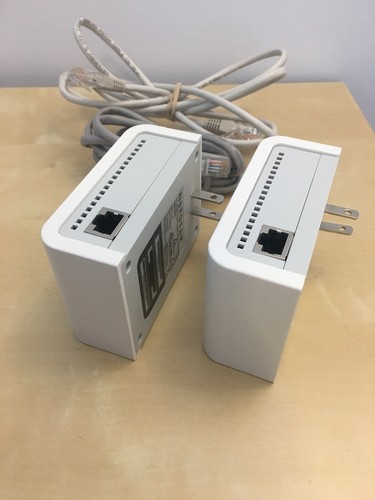 Two Netgear 85 Mbps Wall-Plugged Ethernet Adapters XET1001 with 2 Cat5 cables