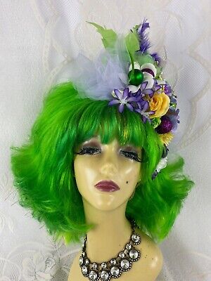 Green Mardi Gras Wig With Purple Flowered Fascinator, Ornaments and Feathers
