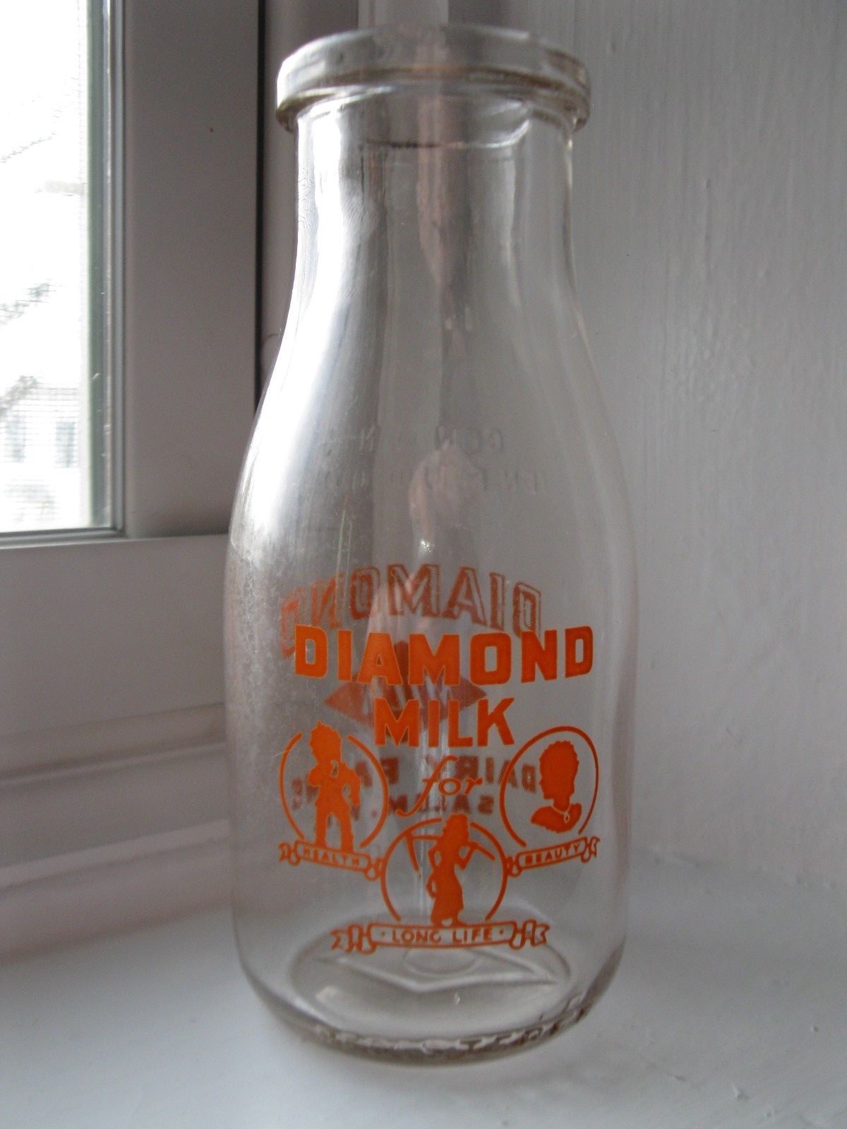 Vintage milk bottle Diamond Dairy Farms Salem, N.H. RD pyro orange 10 ounces