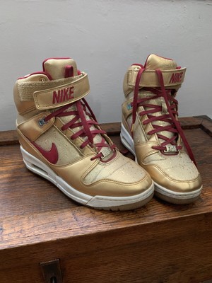 nike revolution sky hi gold