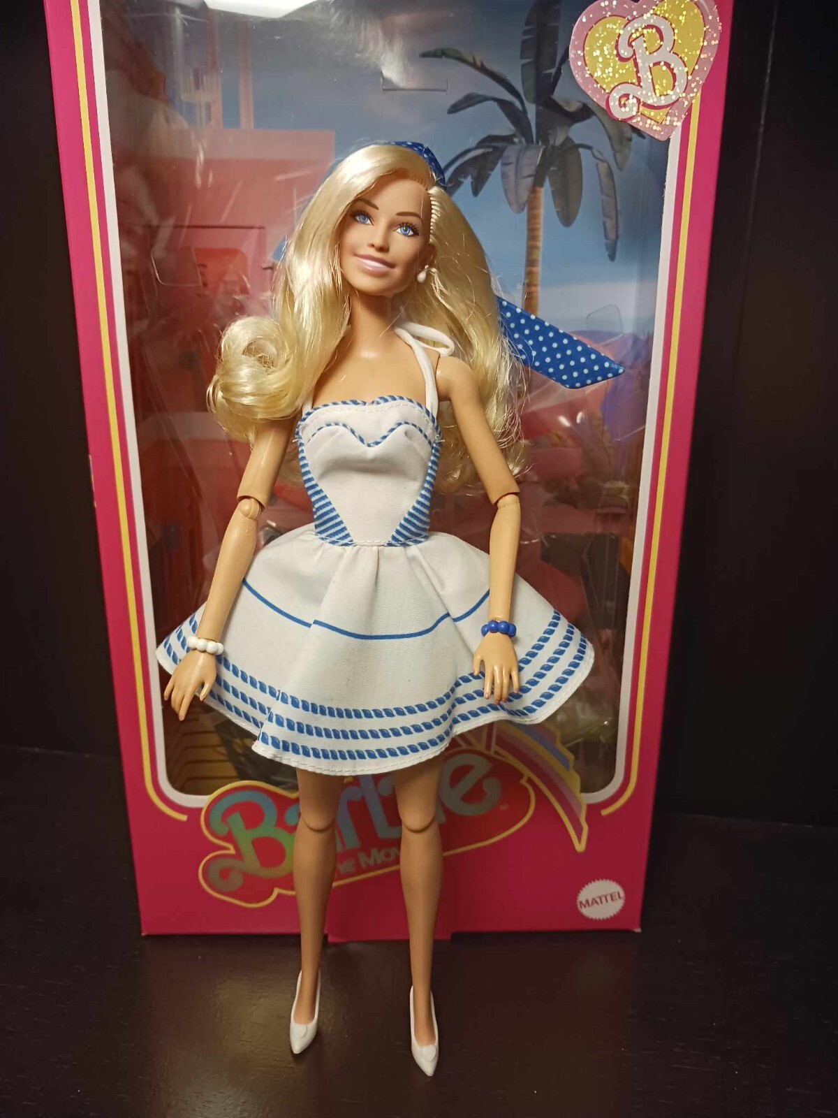 Barbie: The Movie Collectible Doll in one of her Iconic Outfits (Blue Sundress)