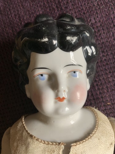 Lovely antique German, brunette china doll With old cloth body