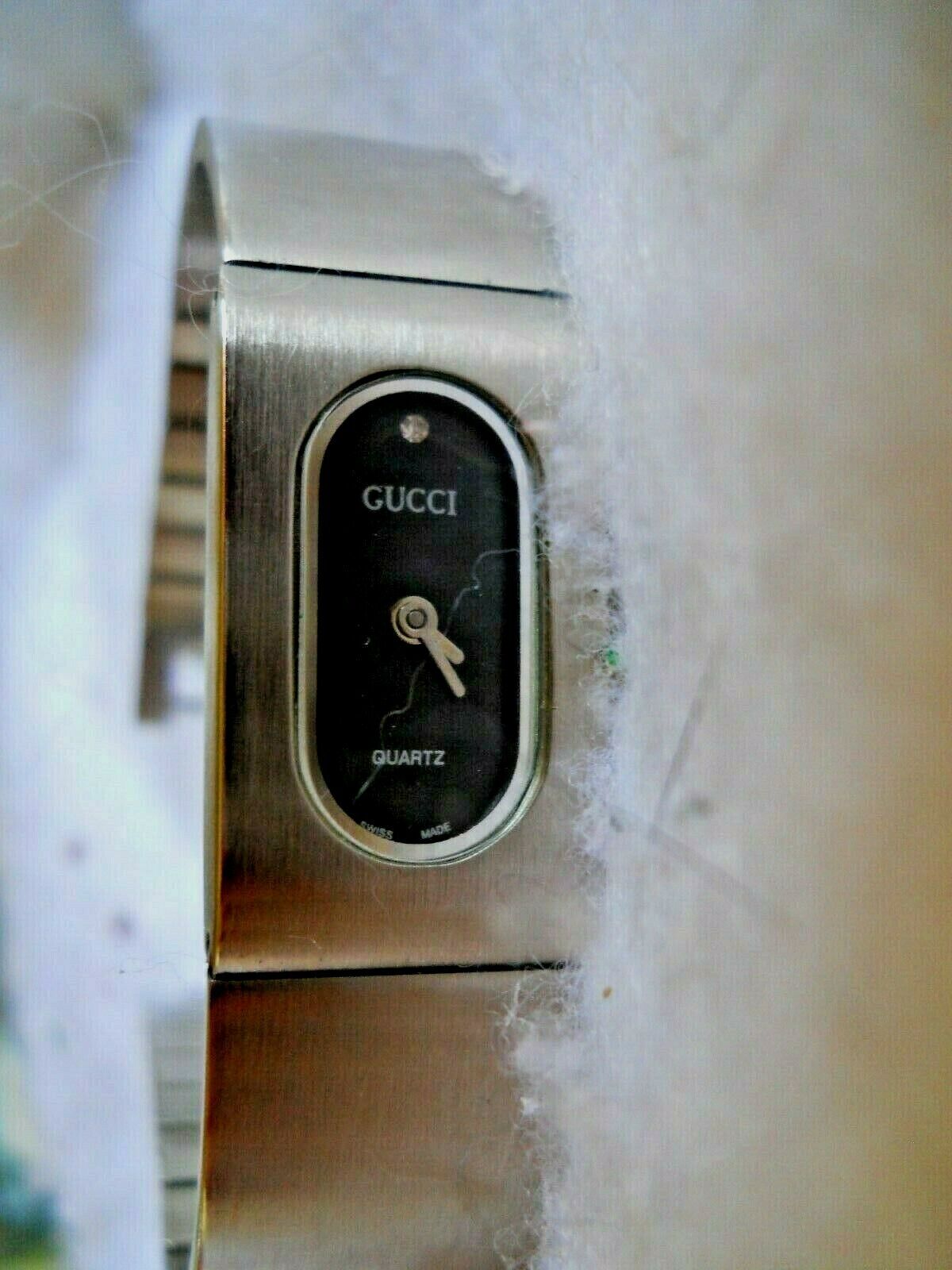 GUCCI Women stainless silver Bangle Cuff 1600 Watch 0065468 GUCCI Women stainless silver Bangle Cuff 1600 Watch 0065468