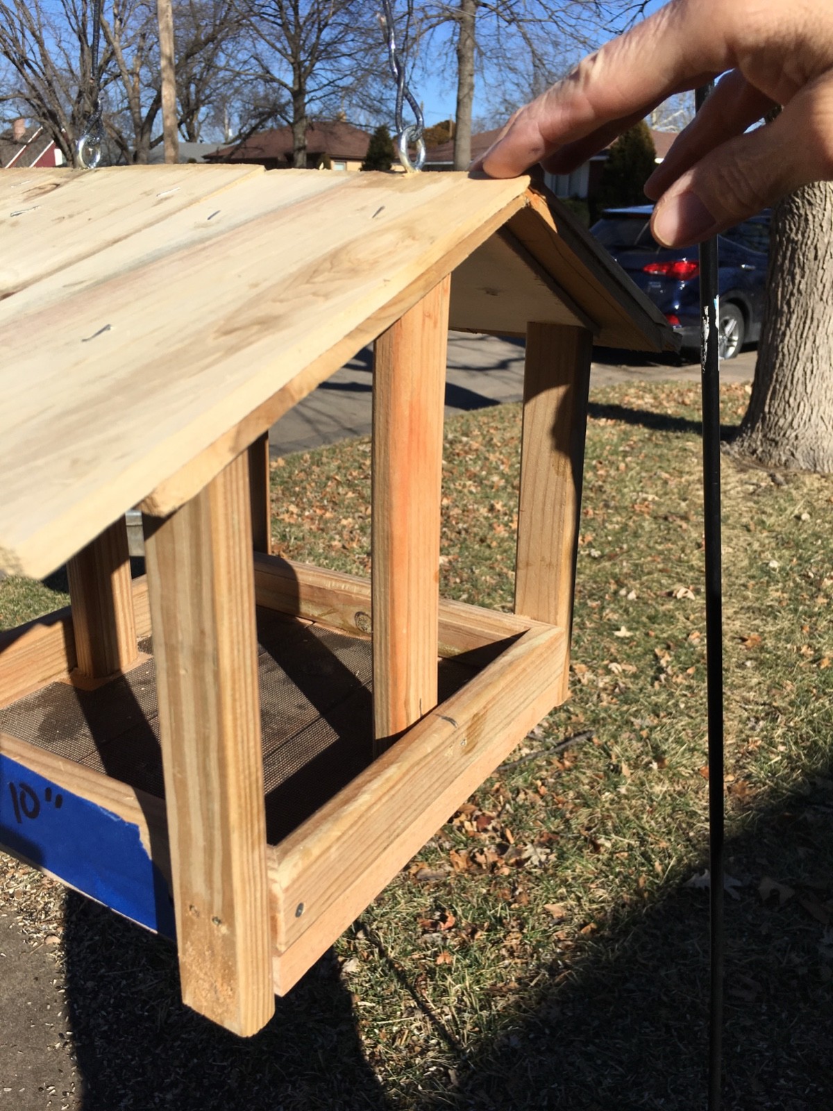 Hand mde rustic bird feeder fly through