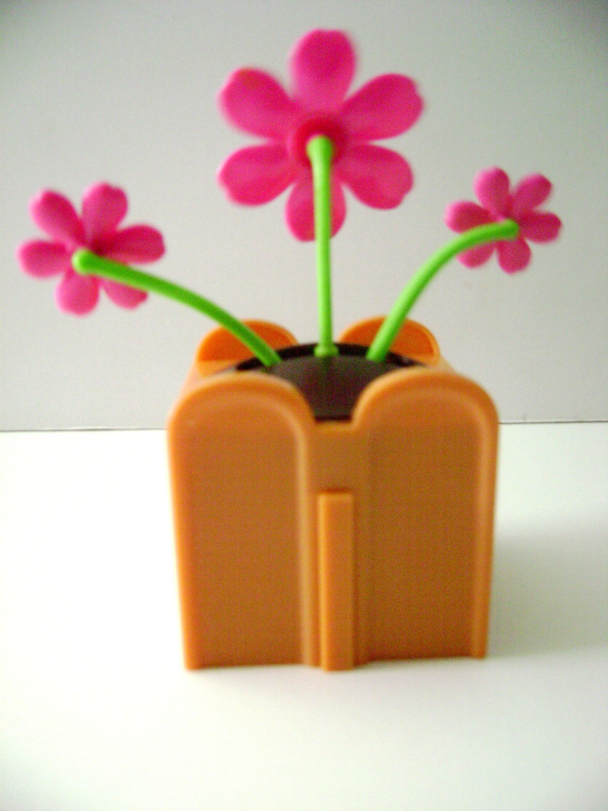 Solar Powered Dancing Red Daisy Flower Flip Flap Plant  (Burnt-Orange) Pot