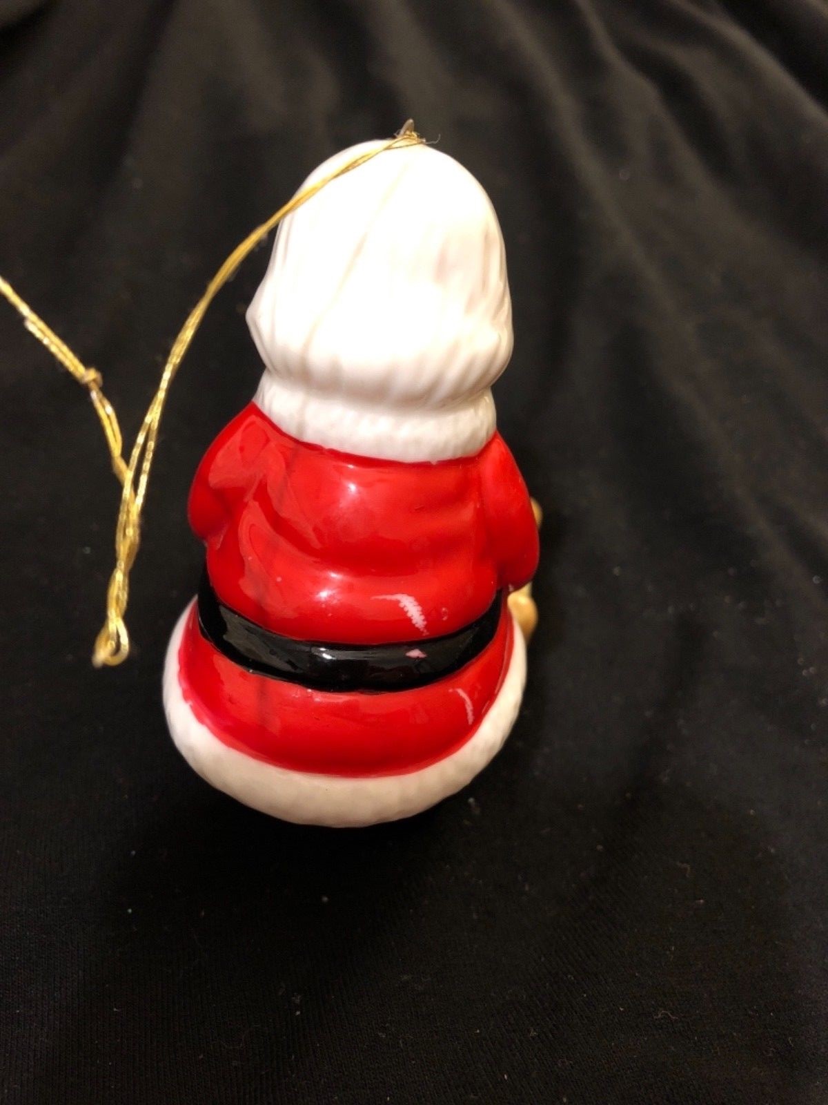 Vintage Christmas Ornament with Santa Bending Over baby Jesus, cute!