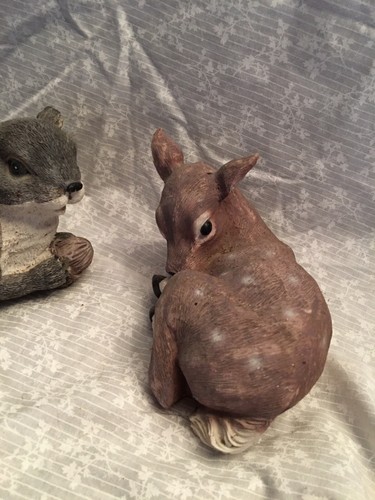 garden figurines. Squirrel, deer/fawn.  5.5 x 4 and 5 x 3 deer