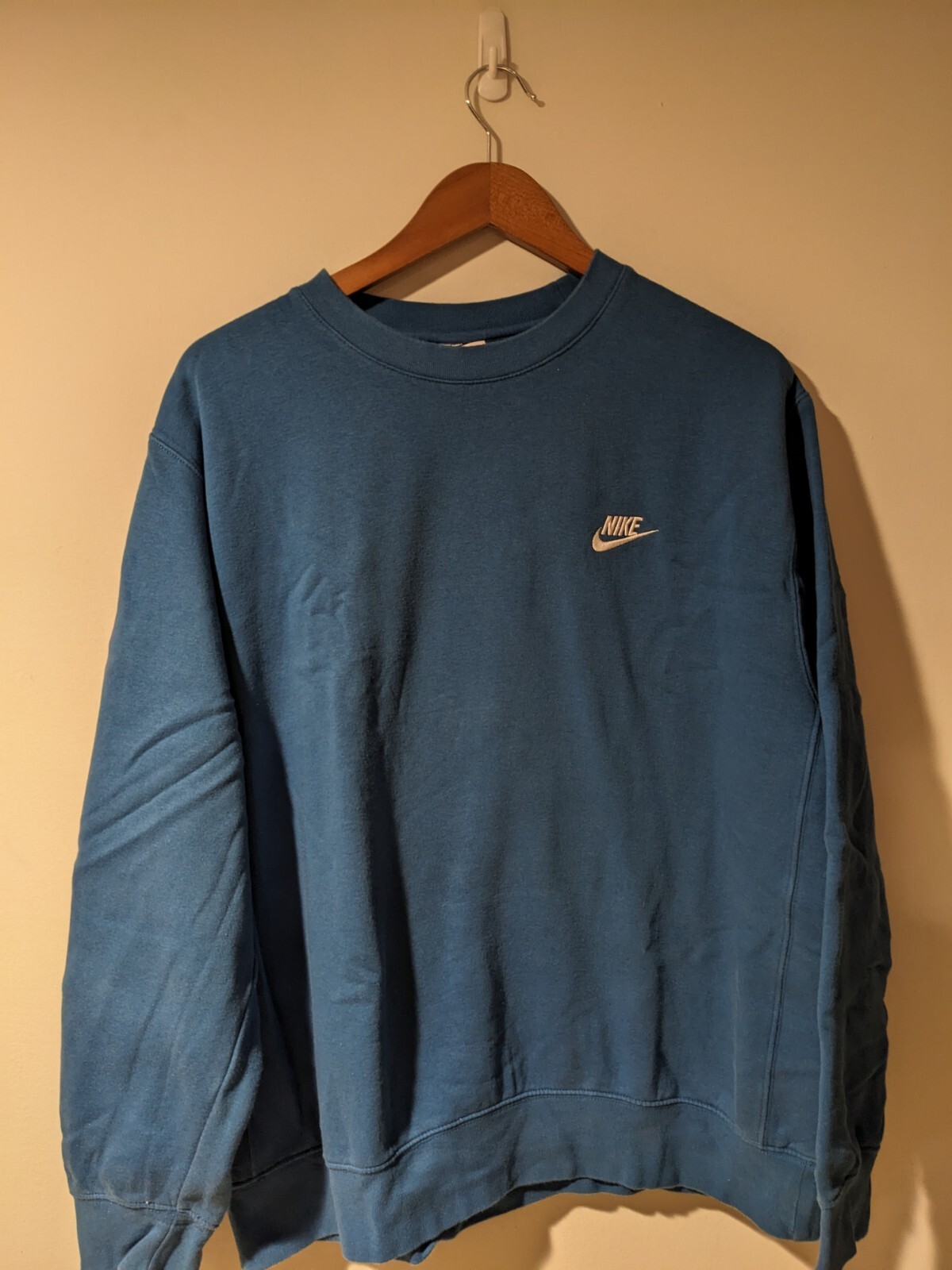 blue nike spell out sweatshirt
