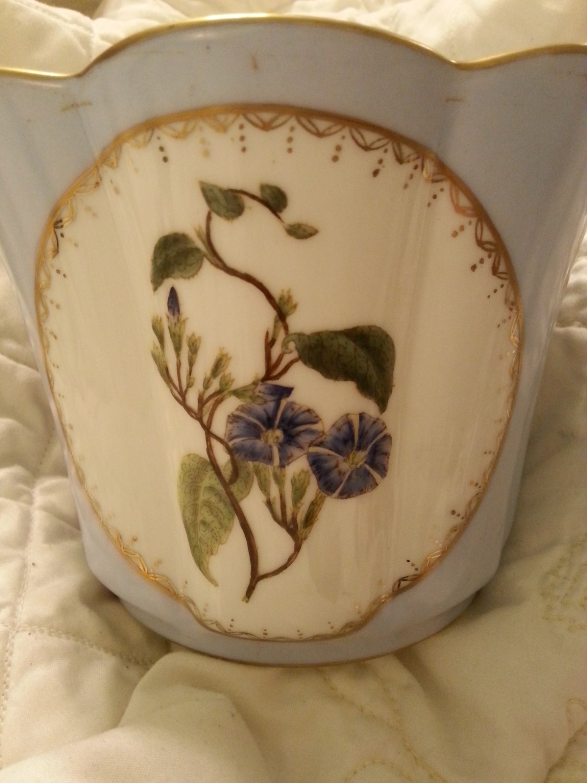 Vintage Style Planter. Light Blue with flower design.  5 inches tall.