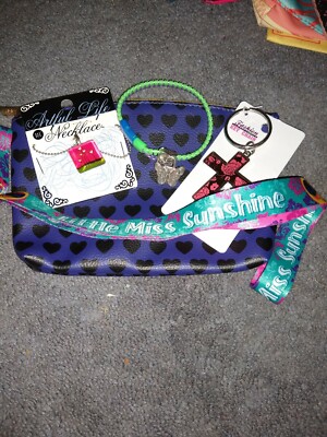 Ipsy bag With Jewelry, Keychain, lanyard ect ..