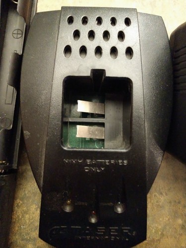 TASER INTERNATIONAL NIMH CHARGER MODEL 44710 WITH TRANSFORMER SET
