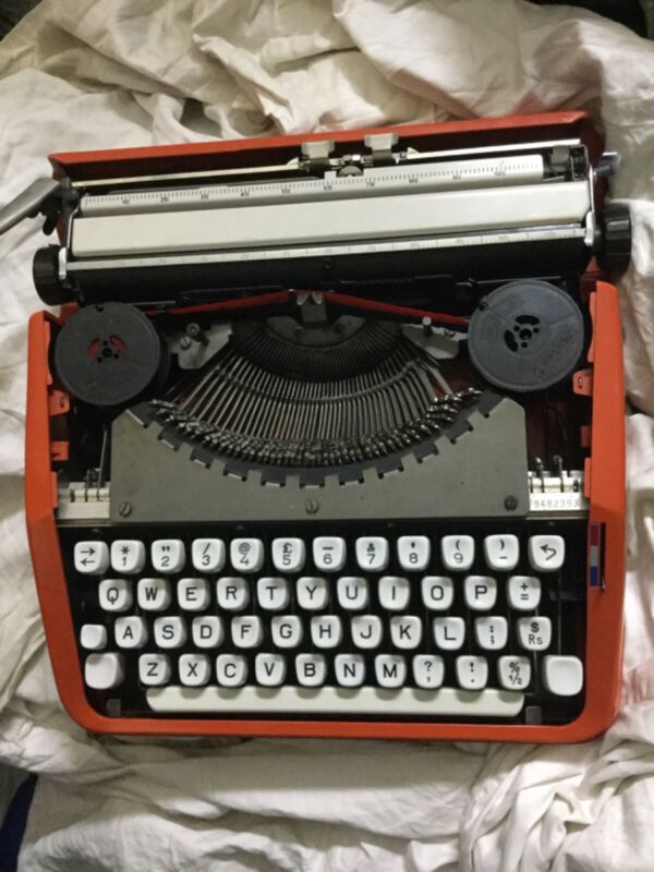 Great Condition• Hermes Baby Orange Typewriter & Case