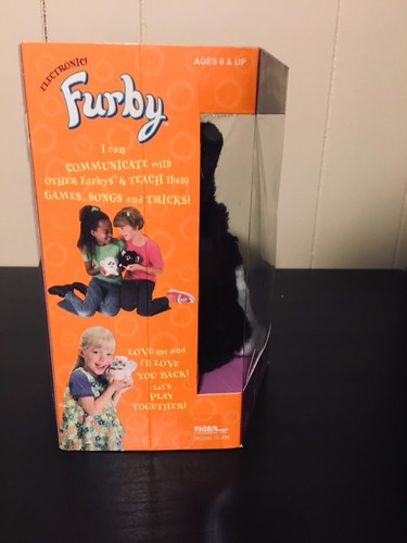 1998 TIGER ELECTRONICS--ELECTRONIC BLACK/WHITE RARE CLOSED EYES. NEW. SEALED