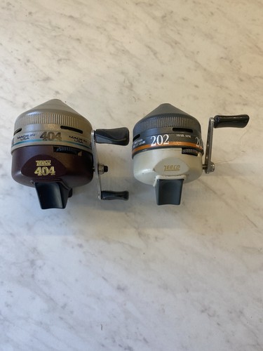 Vintage Zebco Push Button Fishing Reels 404 & 202 Plastic Excellent Cond!