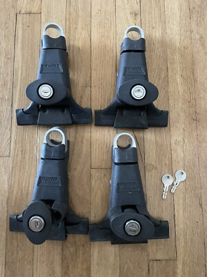 Set of 4 -Yakima 1A Raingutter Towers with Lock Cores, Key, and Rubber Boots