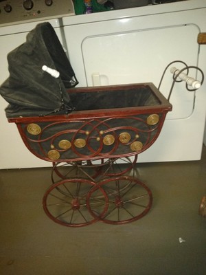 antique wooden baby stroller