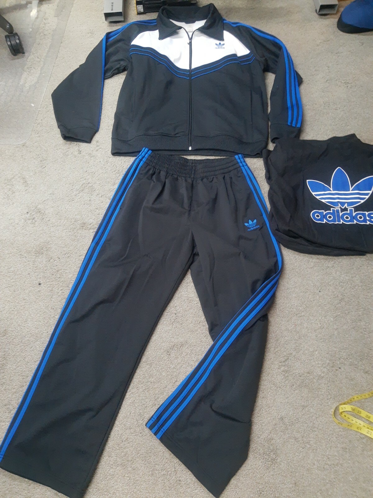 black and blue adidas pants