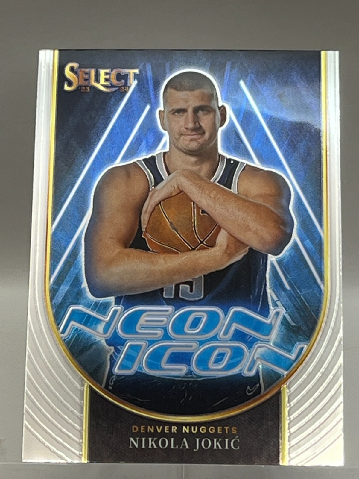 2023-24 Panini Select Basketball Neon Icon Card 23 Nikola