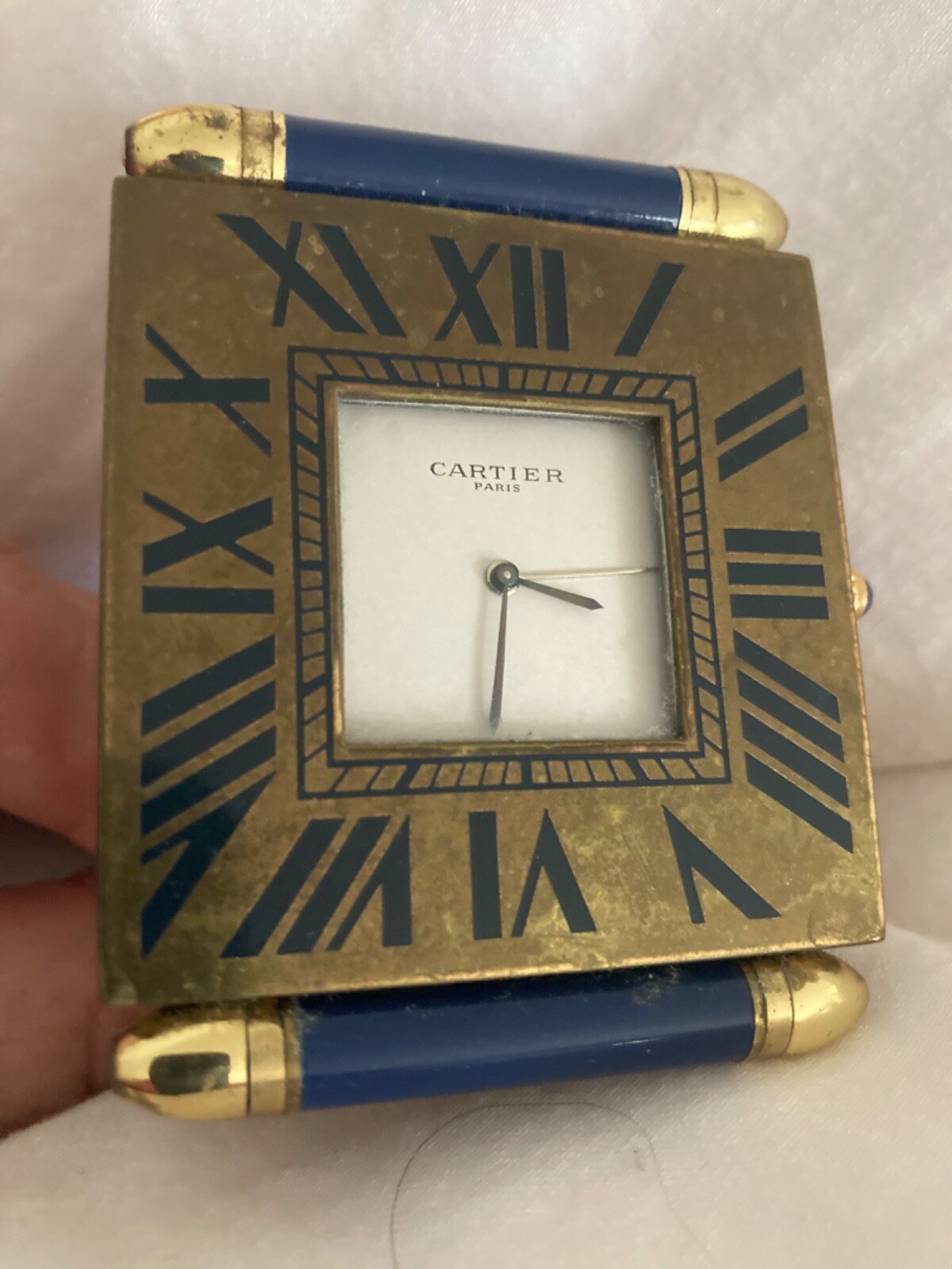 cartier travel clock battery replacement