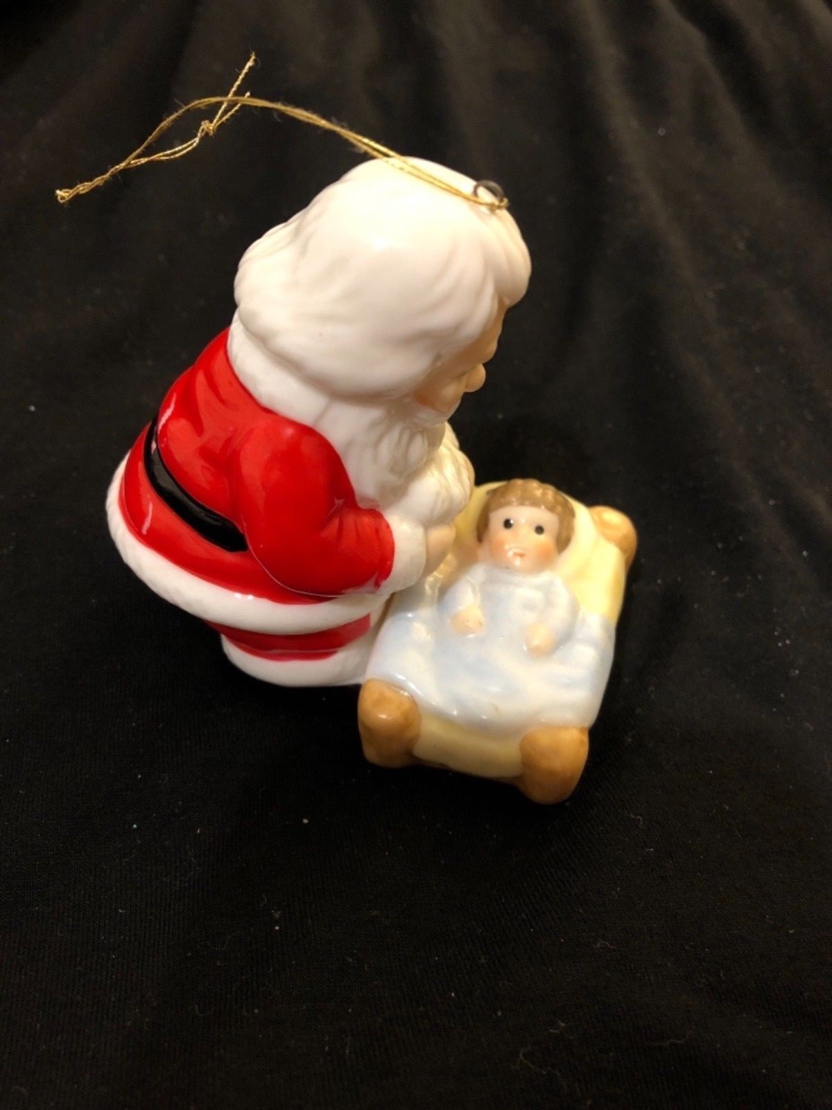 Vintage Christmas Ornament with Santa Bending Over baby Jesus, cute!