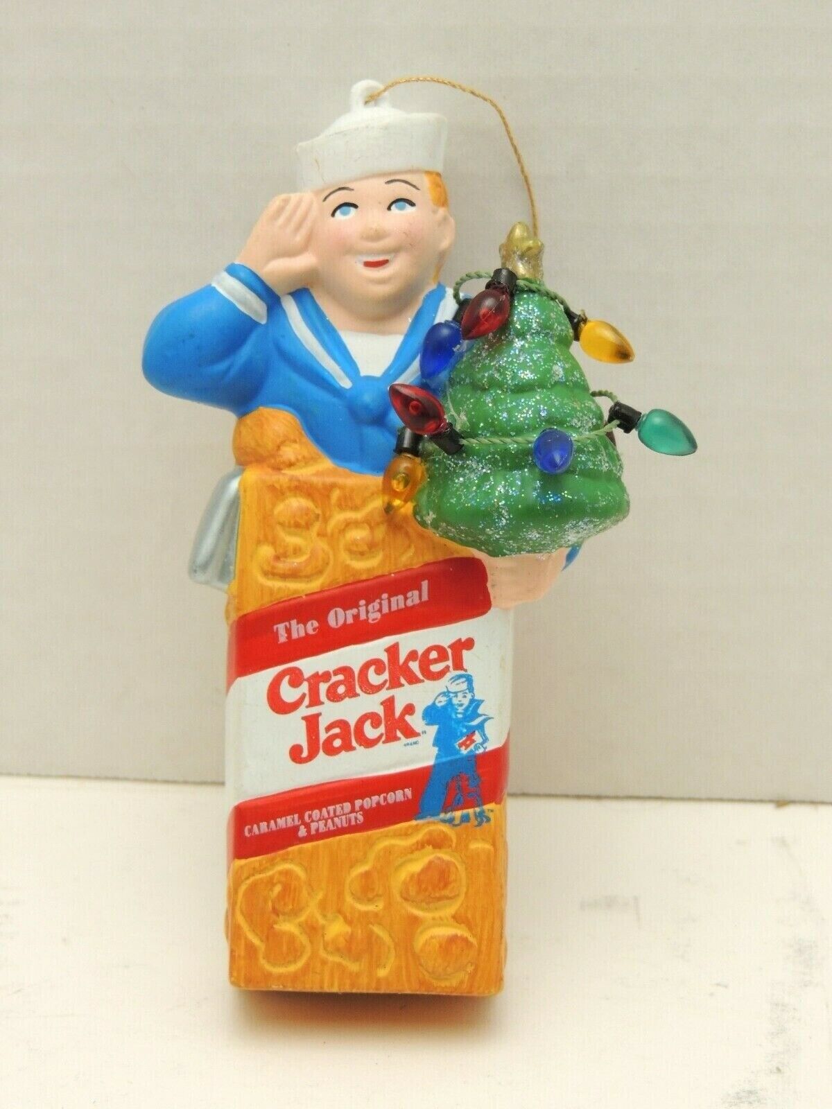 1999 Cracker Jack Box Ornament with Sailor Holding Xmas Tree