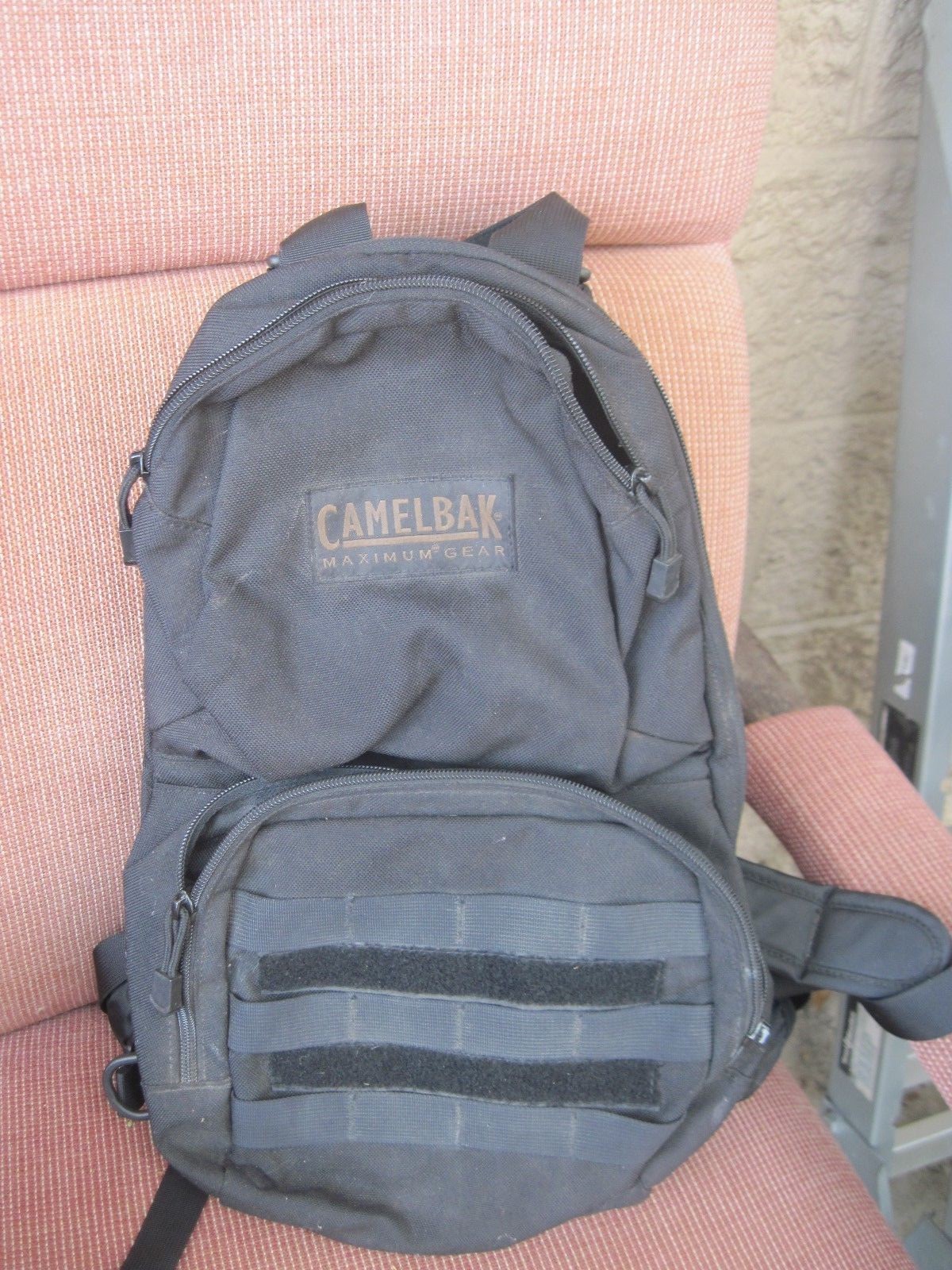 CAMELBAK WITH POCKETS AND NEW BLADDER   BLACK IN  COLOR