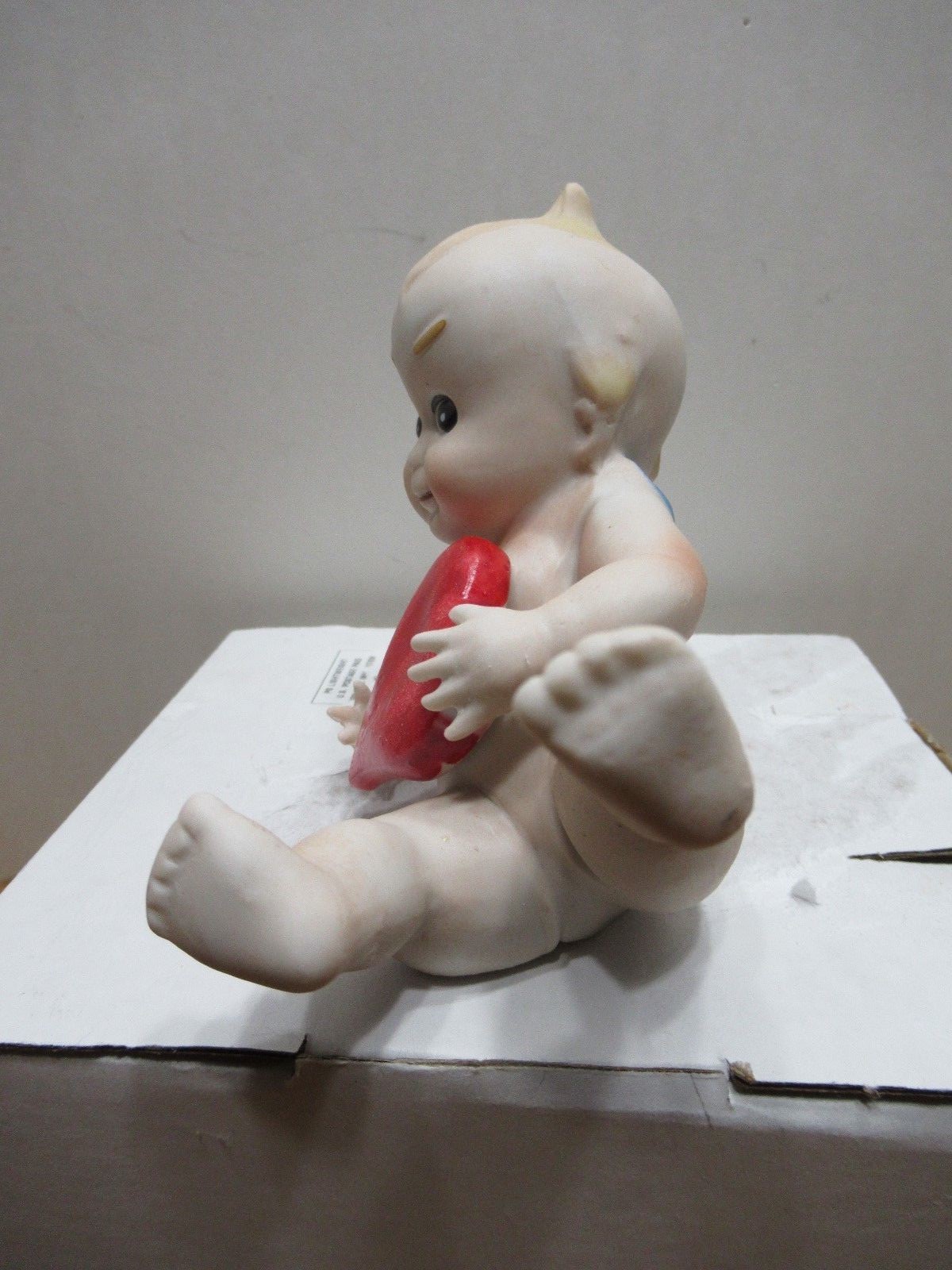 Kewpie Valentine Cupid Porcelain Figurine with a Leaning Pose