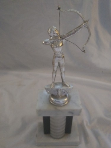 Collection of 11 vintage womens archery trophies