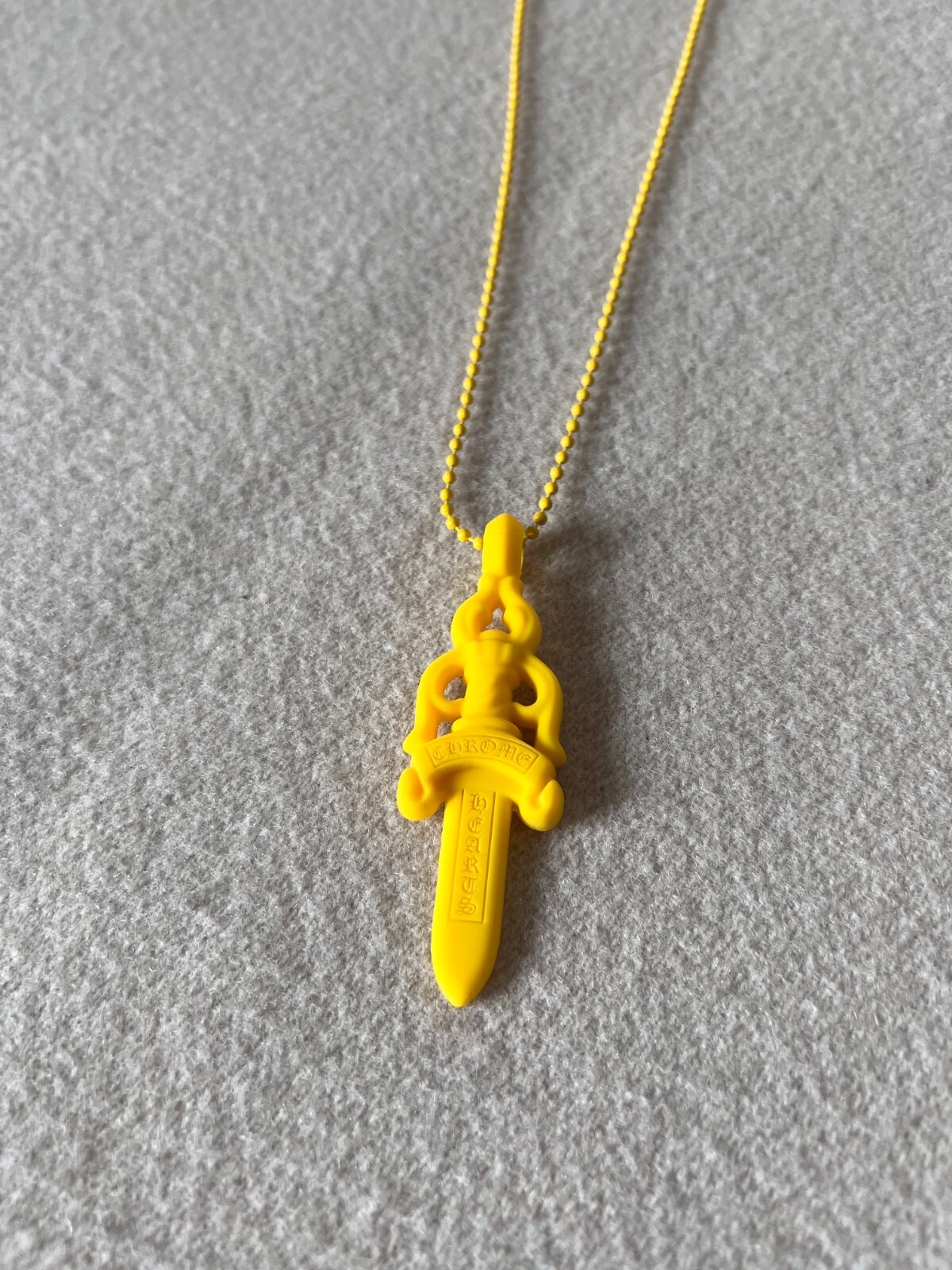Chrome Hearts Silicone Dagger Pendant - Yellow - NEW | eBay Chrome Hearts Silicone Dagger Pendant - Yellow - NEW | eBay
