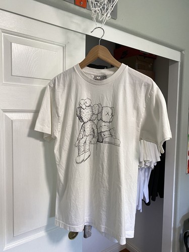 kaws seeing watching t shirt