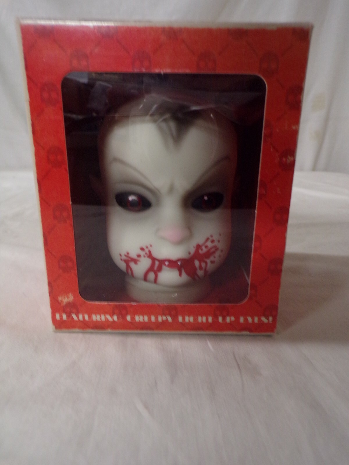 (A) BABY BLEEDS YOU ALIVE Creepy Doll Head w/ Light Up Eyes from Horror Block
