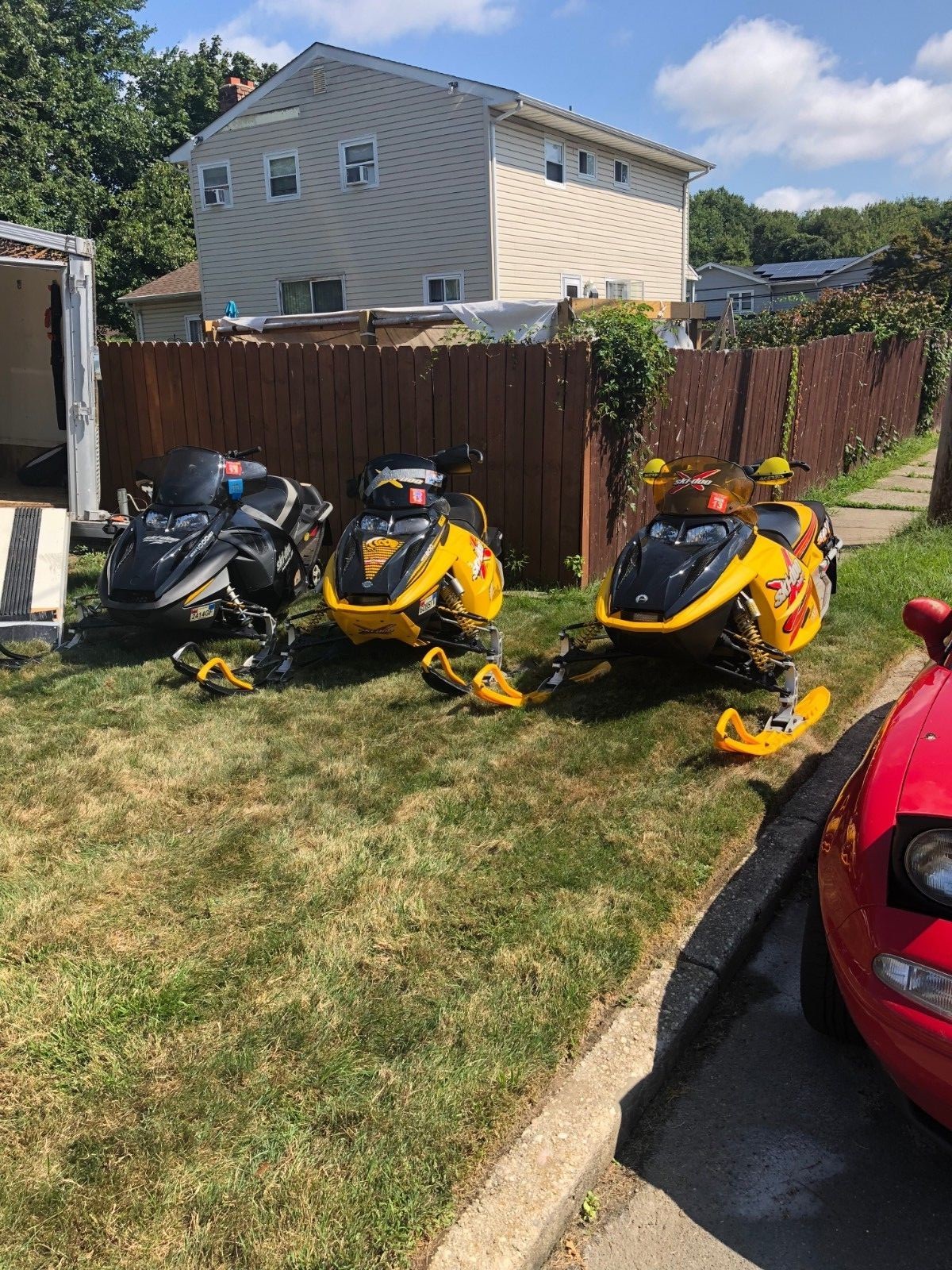 SKI-DOO SNOW MOBILES AND RANCH TRAILER