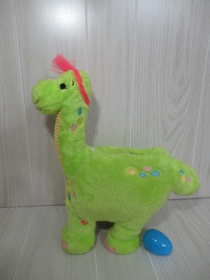 Hallmark Egg Laying Dinosaur animated plush sings Salt Peppa's Push it Good